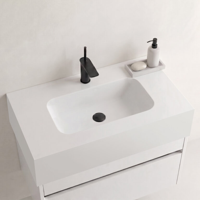 Encimera Solid Bath con lavabo centrado con faldón
