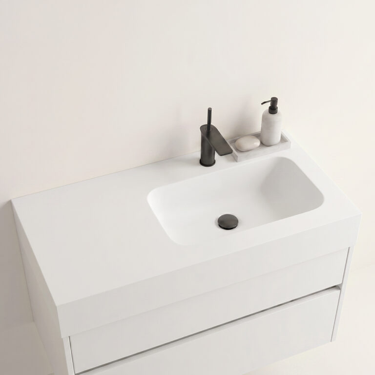 Encimera Solid Bath con lavabo desplazado con faldón